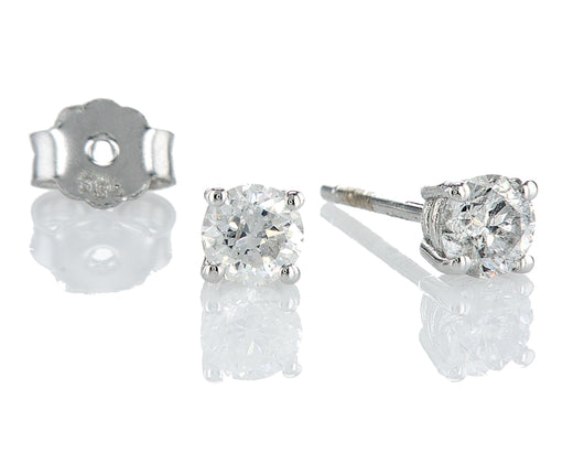 עגילים צמודים חווה Fermond Jewelery F-004-10: מק"ט  זוג עגילי זהב לבן. העגילים בעלי עיצוב עגול וצמוד אוזן. במרכז כל עגיל יושב יהלום טבעי עגול. היהלום מנצנץ בזוהר יפהפה ומוסיף נופך של אלגנטיות לעגילים. העגילים יושבים בנוחות על האוזן והם בחירה מצוינת הן לאירועים מיוחדים והן ללבישה יומיומית.