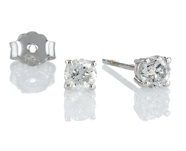 עגילים צמודים חווה Fermond Jewelery F-004-10: מק"ט  זוג עגילי זהב לבן. העגילים בעלי עיצוב עגול וצמוד אוזן. במרכז כל עגיל יושב יהלום טבעי עגול. היהלום מנצנץ בזוהר יפהפה ומוסיף נופך של אלגנטיות לעגילים. העגילים יושבים בנוחות על האוזן והם בחירה מצוינת הן לאירועים מיוחדים והן ללבישה יומיומית.
