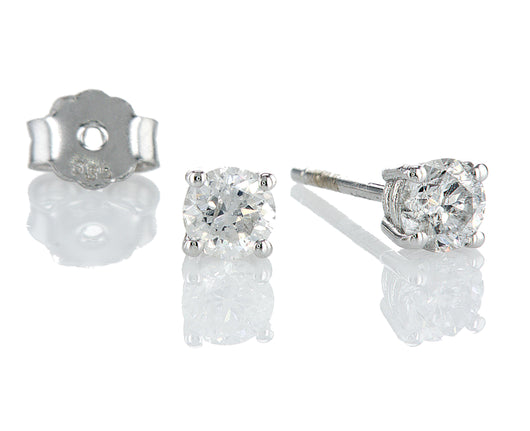 עגילים  צמודים טלי Fermond Jewelery  זוג עגילי זהב לבן. העגילים בעלי עיצוב עגול וצמוד אוזן. במרכז כל עגיל יושב יהלום טבעי עגול. היהלום מנצנץ בזוהר יפהפה ומוסיף נופך של אלגנטיות לעגילים. העגילים יושבים בנוחות על האוזן והם בחירה מצוינת הן לאירועים מיוחדים והן ללבישה יומיומית.