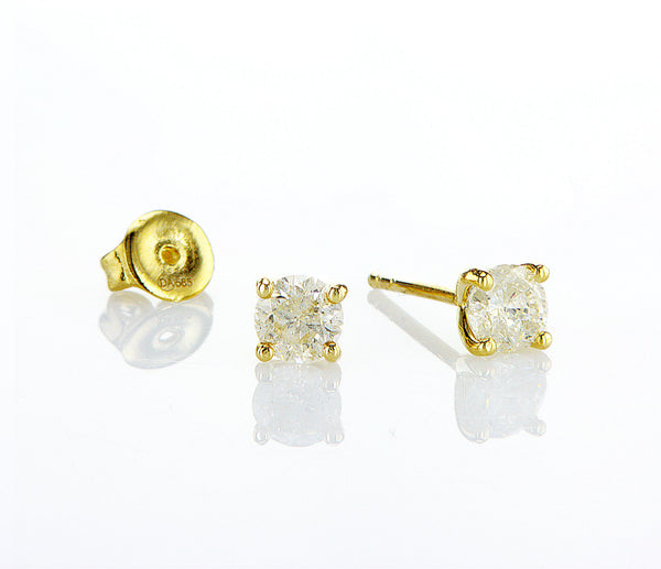 עגילים צמודים ליטל Fermond Jewelery  זוג עגילי זהב צהוב. העגילים בעלי עיצוב עגול וצמוד אוזן. במרכז כל עגיל יושב יהלום טבעי עגול. היהלום מנצנץ בזוהר יפהפה ומוסיף נופך של אלגנטיות לעגילים. העגילים יושבים בנוחות על האוזן והם בחירה מצוינת הן לאירועים מיוחדים והן ללבישה יומיומית.
