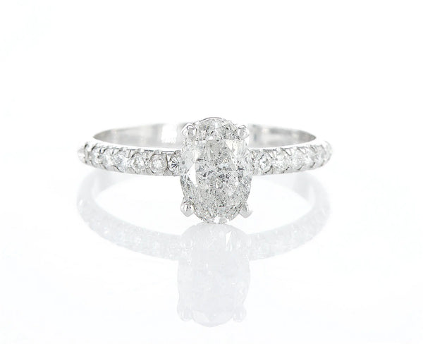 טבעת אירוסין פאר Fermond Jewelery  יהלומים טבעיים, טבעת משובצת ביהלום טבעי בליטוש אובל ומוקף בכתר יהלומים, יהלומים הם לנצח והטבעת הזאת מסמלת נצחיות. כמות אבנים צדדיות 24 .ומשקלם 0.26 קראט, סך . הכל אבנים משובצות 1.27 קראט, תכשיט מושלם ליום מושלם שימשוך הרבה תשומת לב, .ישדר יוקרה וחן וינצוץ לך על האצבע כמו קרן שמש ביום חשוך.